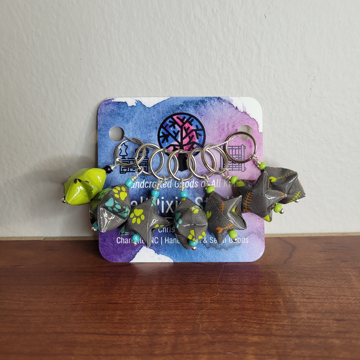 Stitch Marker | Handmade Paper Stars | Green/Blue/Grey Pawprints | Set of 7